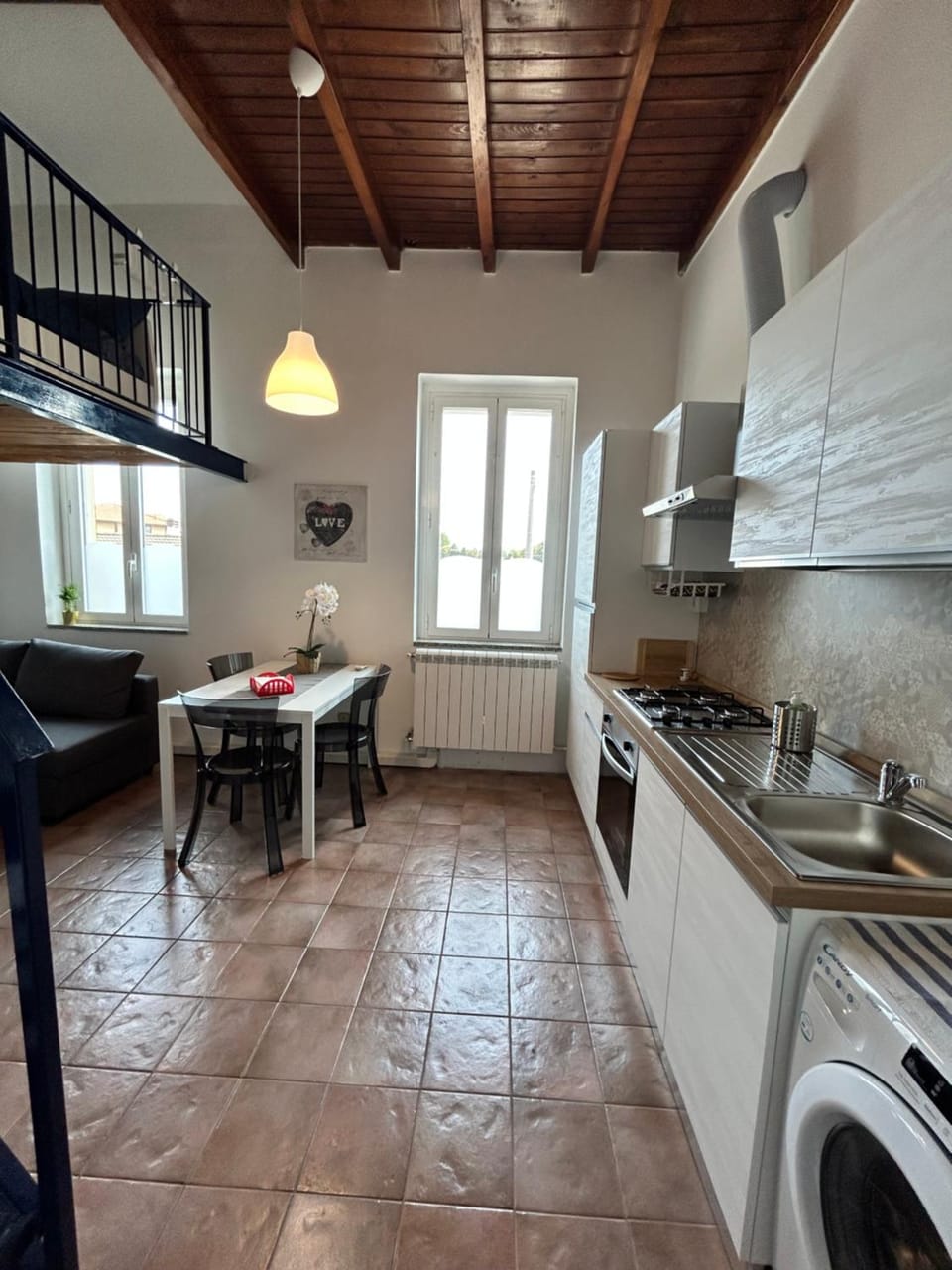 Kitchen or kitchenette, Dining area, stove, washing machine