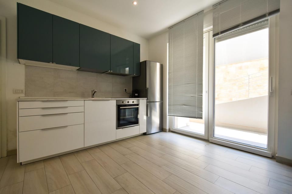 Kitchen or kitchenette, oven, stove