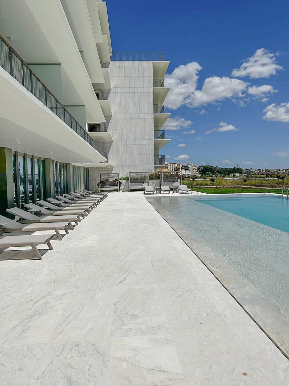 Swimming pool, sunbed