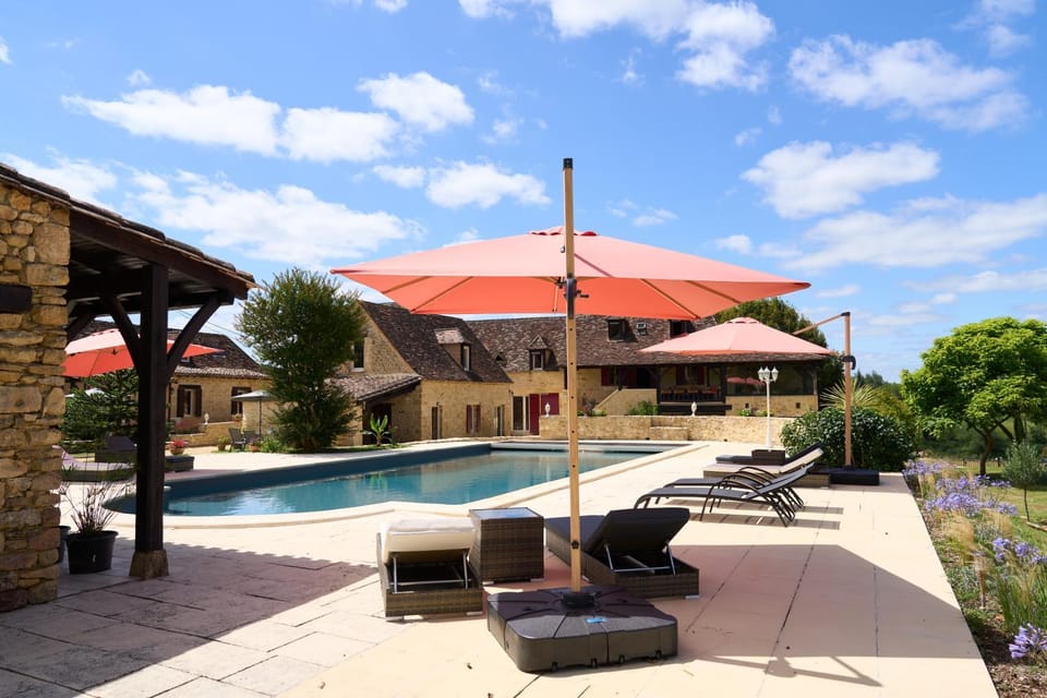 Property building, Patio, Pool view, Swimming pool, sunbed