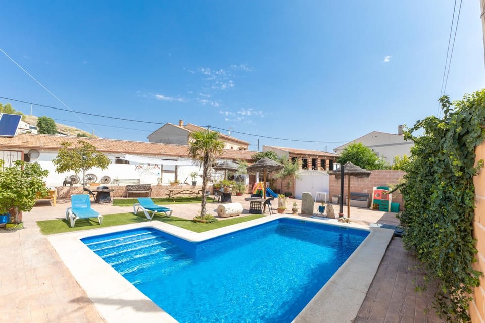 Property building, Living room, Swimming pool