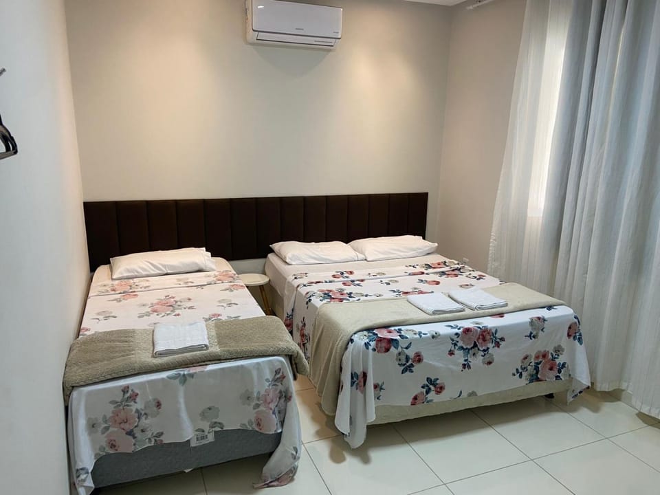 Bed, Photo of the whole room, towels, air conditioner