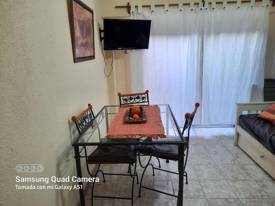 Bed, TV and multimedia, Living room, Seating area, Dining area