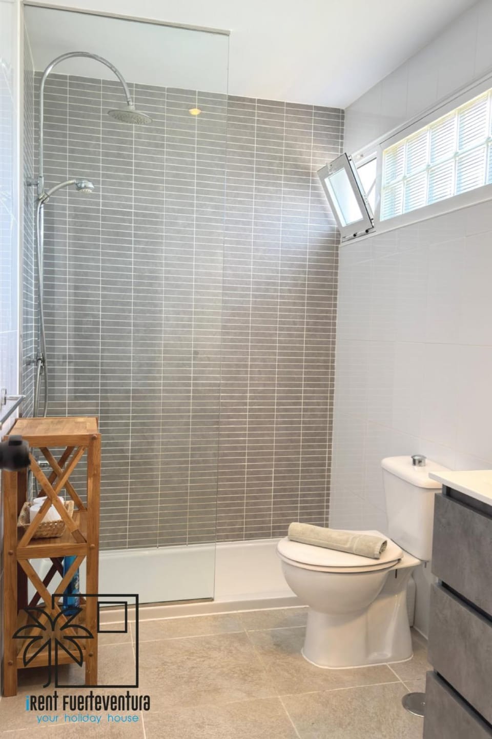 Shower, Toilet, Bathroom, hair dryier, towels