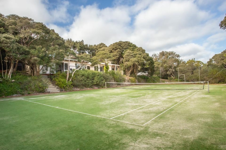 Merchant of Tennis House in Portsea