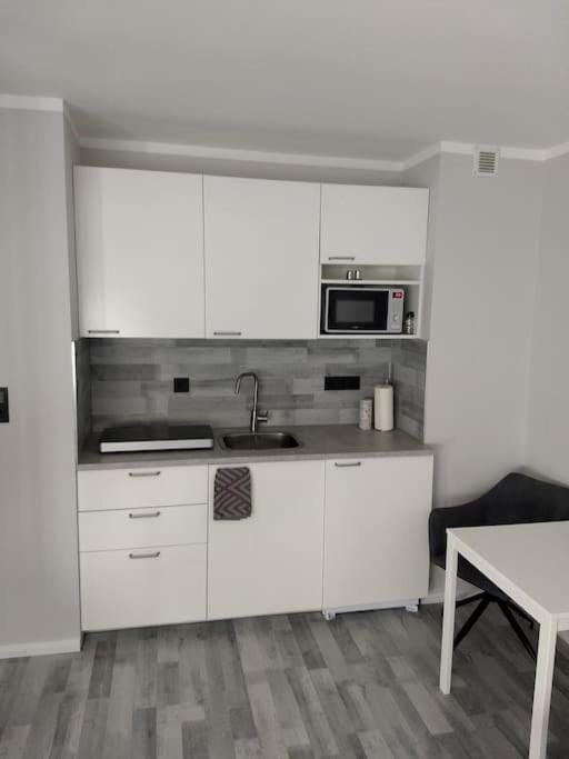 Kitchen or kitchenette, stove