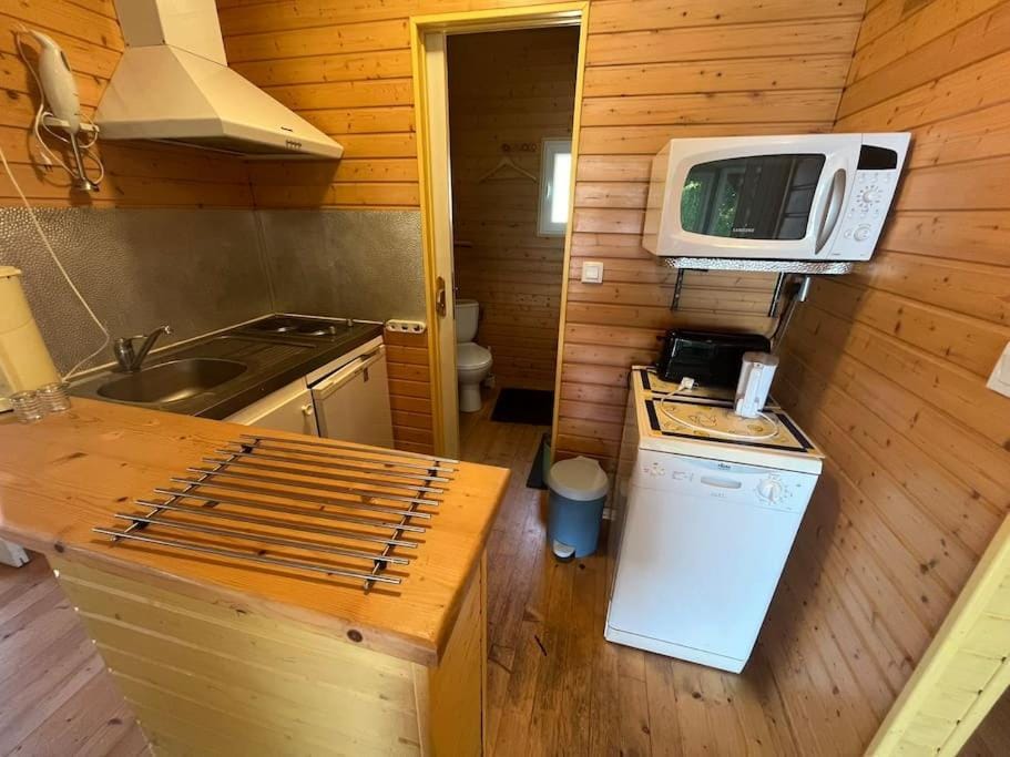 Kitchen or kitchenette, oven, stove, toaster