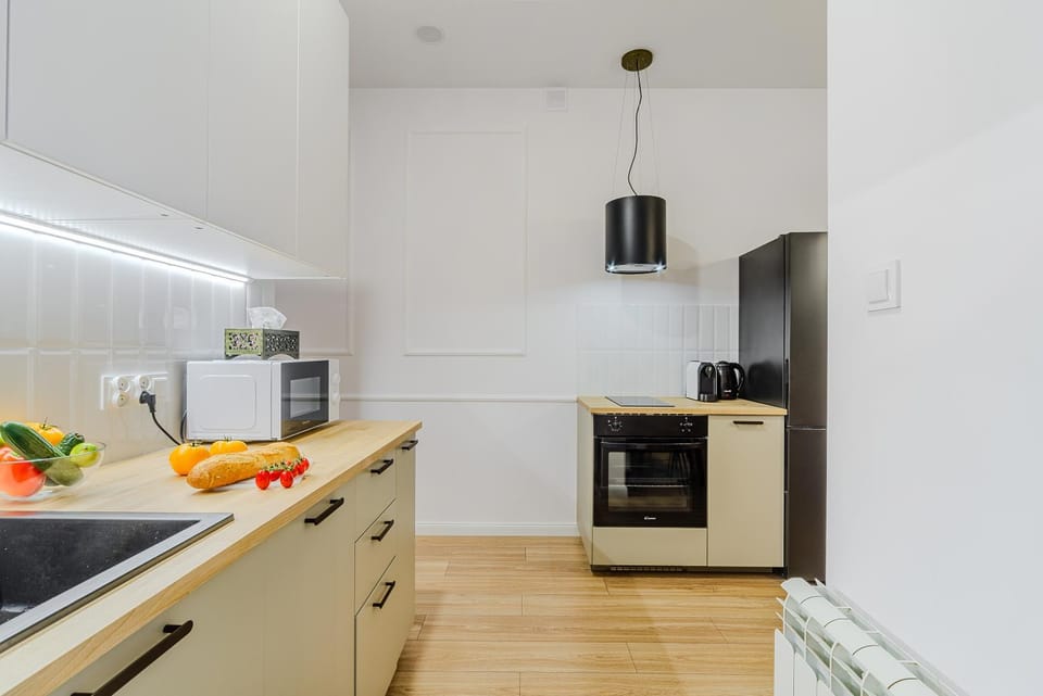 Kitchen or kitchenette, microwave, oven