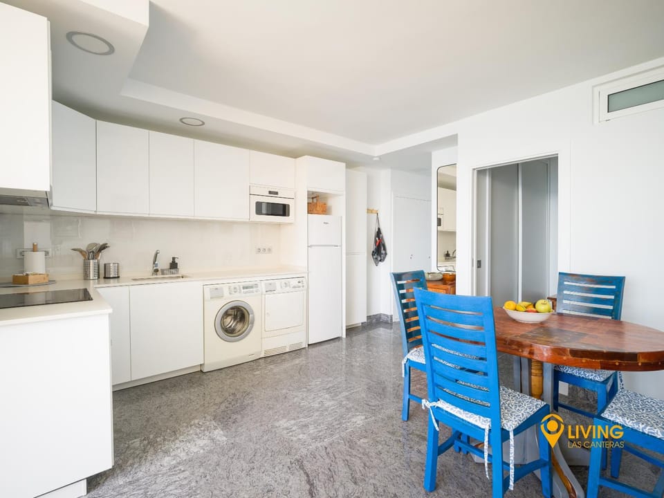 Kitchen or kitchenette, Dining area, oven, stove, toaster, washing machine, dryer
