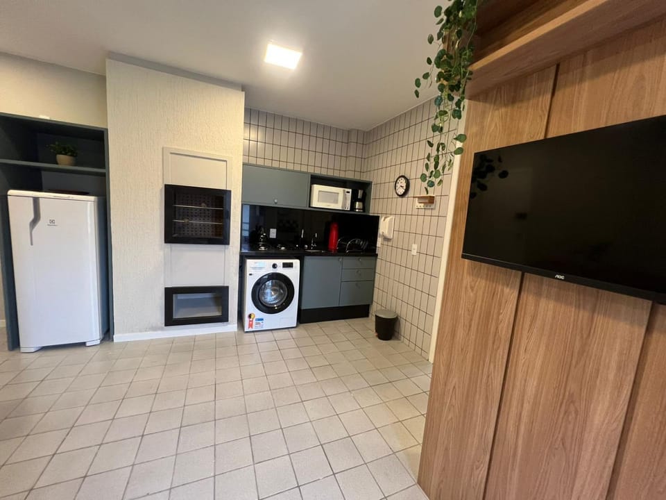 Kitchen or kitchenette, washing machine