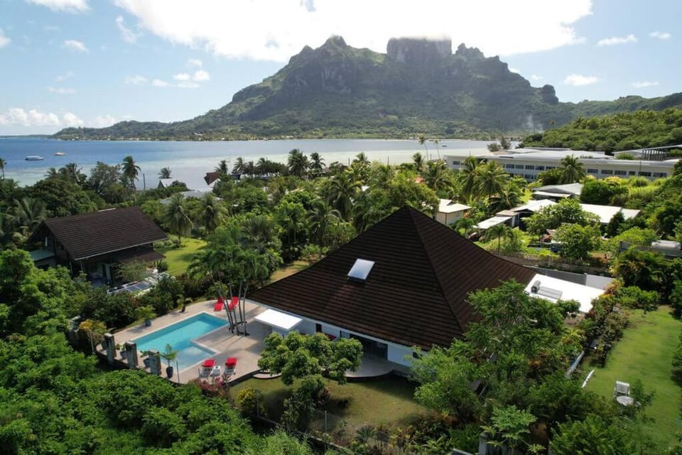 Property building, Natural landscape, Bird's eye view, Mountain view, Swimming pool