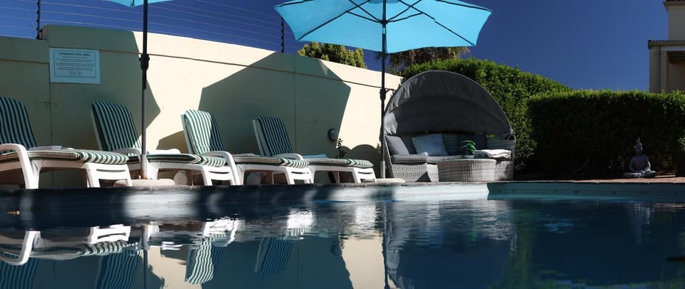 Swimming pool, sunbed