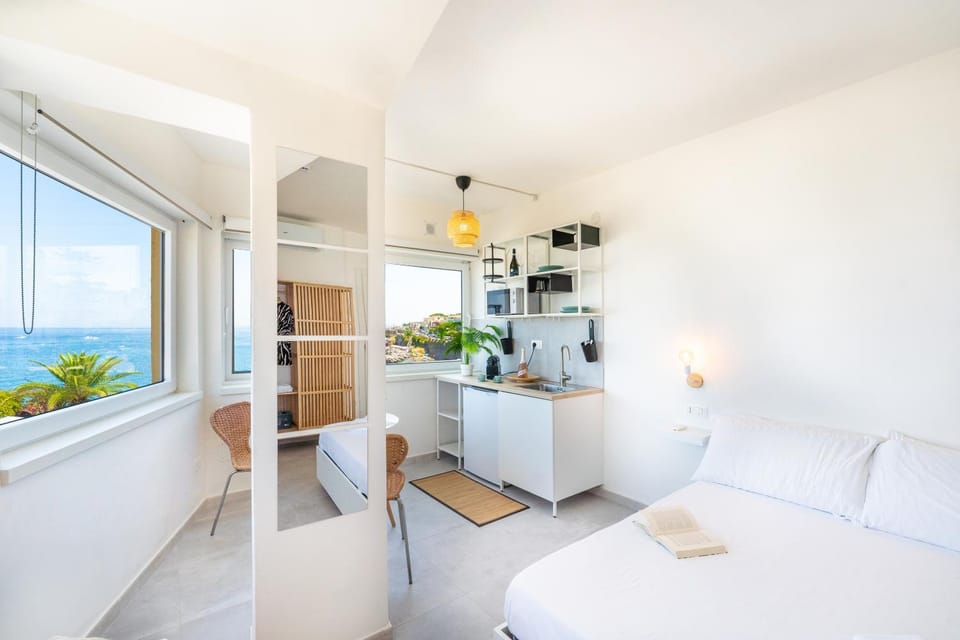 Bed, Natural landscape, Kitchen or kitchenette, Living room, Photo of the whole room, Seating area, Dining area, Bedroom, Sea view