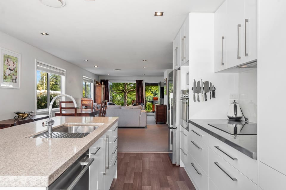 Kitchen or kitchenette, dishwasher, oven, stove