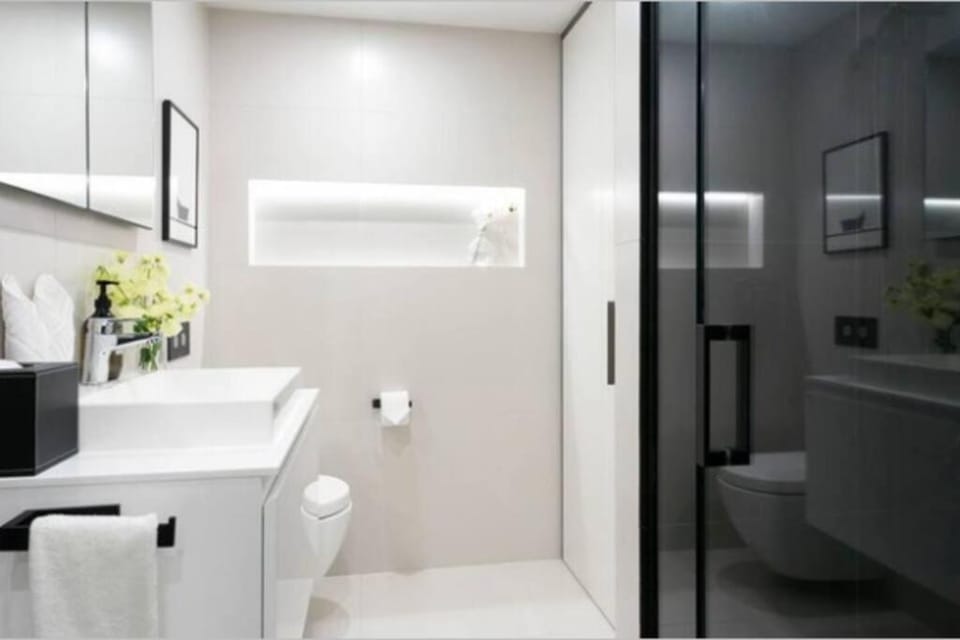 Shower, Toilet, Bathroom, hair dryier, towels