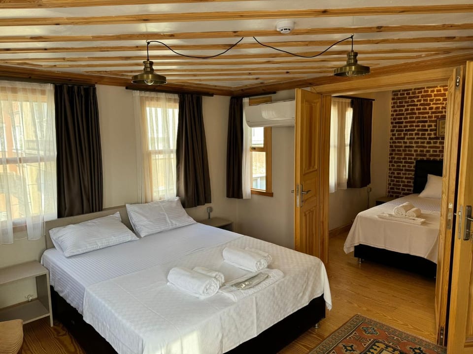 Bed, Photo of the whole room, Bedroom, towels, air conditioner