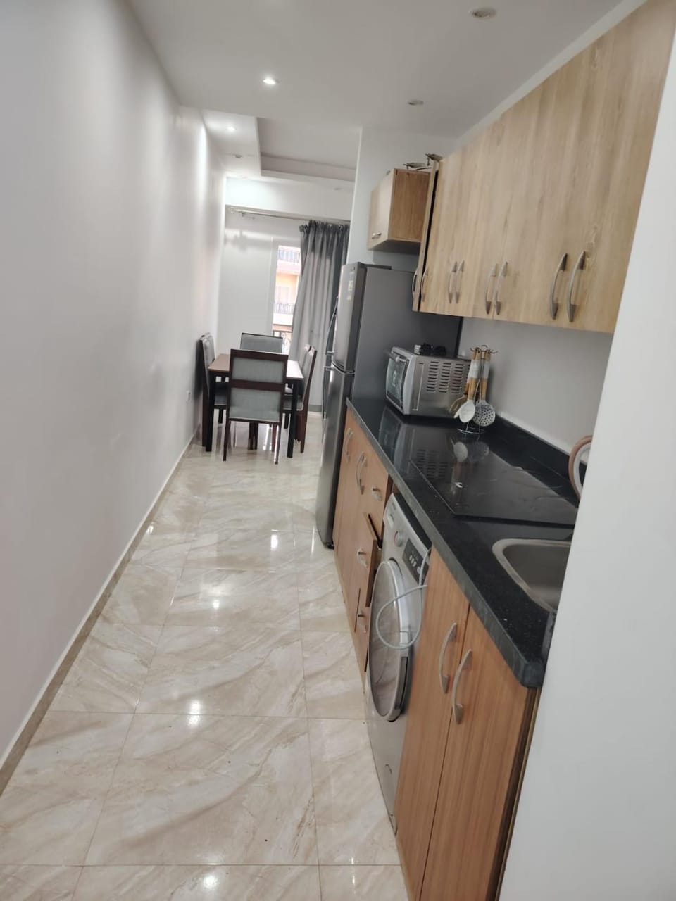 Kitchen or kitchenette, dishwasher, stove