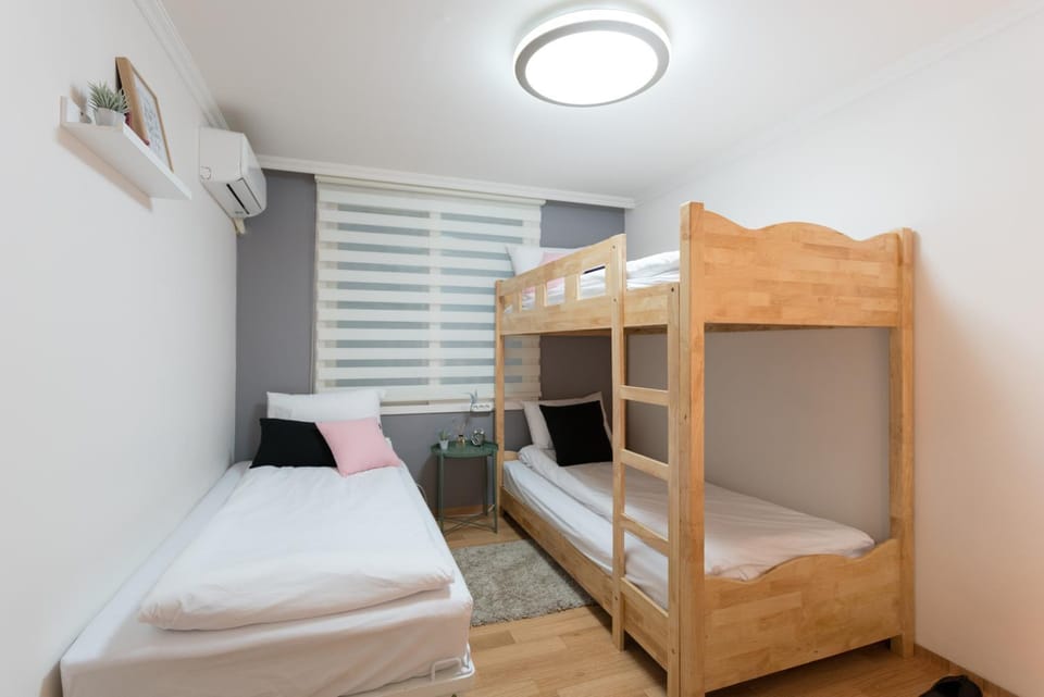 Bed, Bedroom, bunk bed, towels, air conditioner