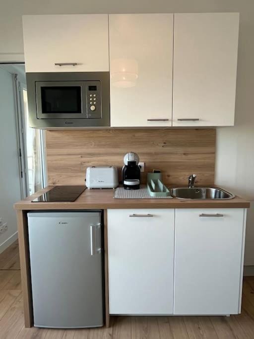 Appartement Bord de mer, accès direct plage Apartment in Courseulles-sur-Mer