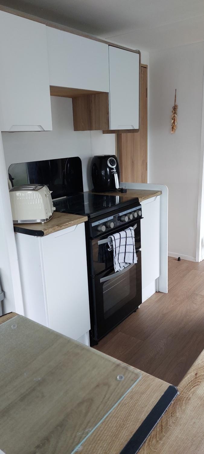 Kitchen or kitchenette, stove, toaster