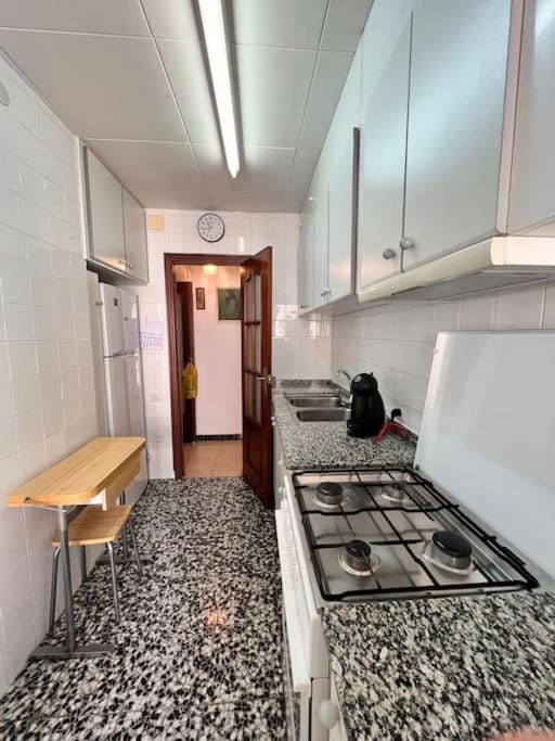 Kitchen or kitchenette, oven, stove