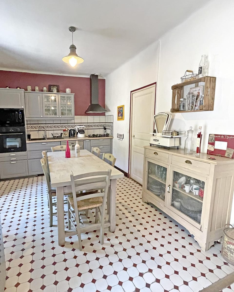 Kitchen or kitchenette, dishwasher, oven, stove, toaster