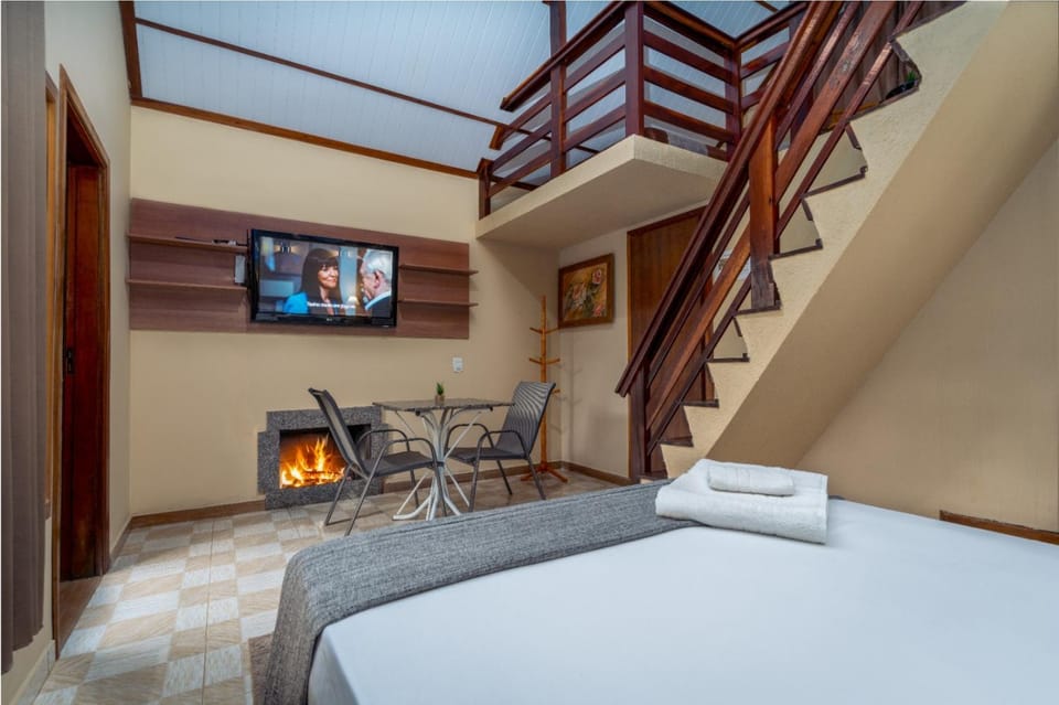 Bed, TV and multimedia, fireplace