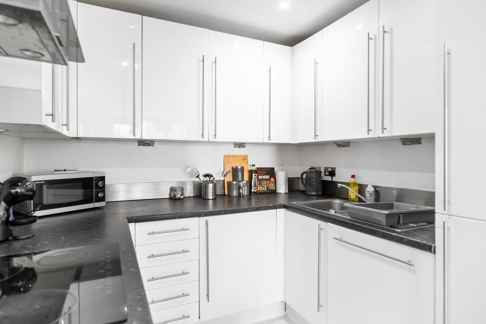 Kitchen or kitchenette, microwave, oven, stove, toaster