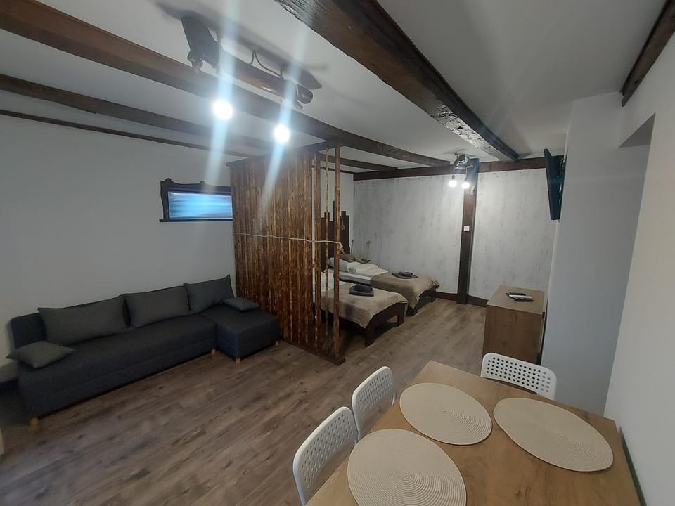 Bed, Living room, Seating area, Dining area