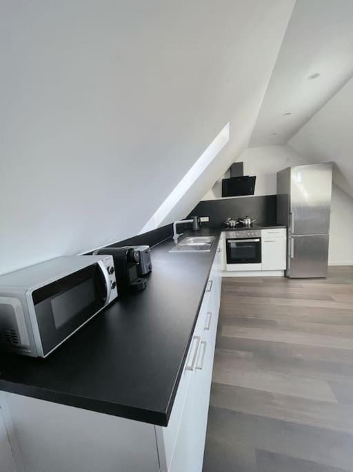 Kitchen or kitchenette, oven, stove, toaster