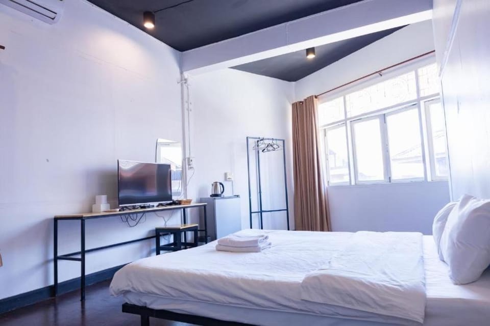 Bed, Photo of the whole room, Bedroom, towels, air conditioner