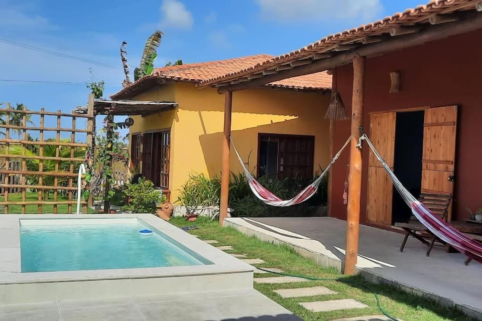 Property building, Patio, Day, Natural landscape, Garden, Garden view, Pool view, Swimming pool, sunbed