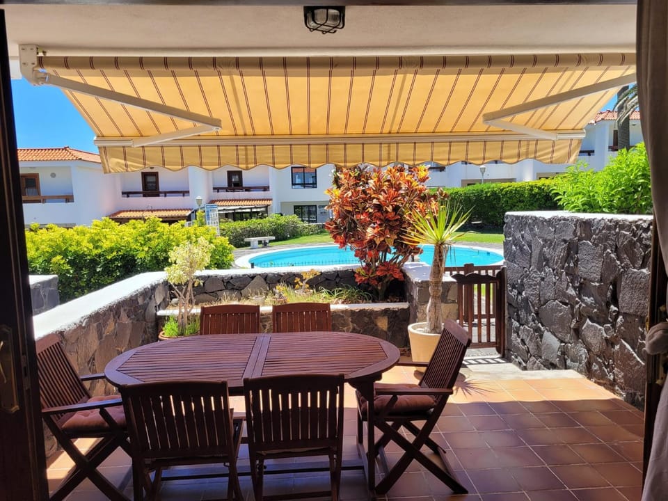 View (from property/room), Balcony/Terrace, Dining area, Pool view, Swimming pool