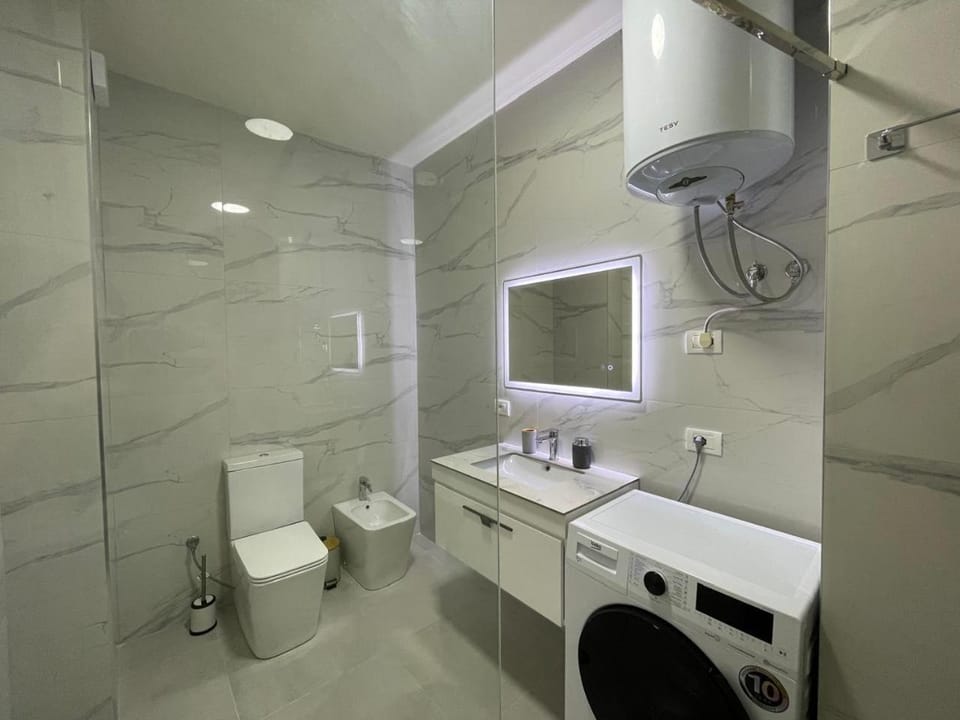 Bathroom, washing machine, dryer