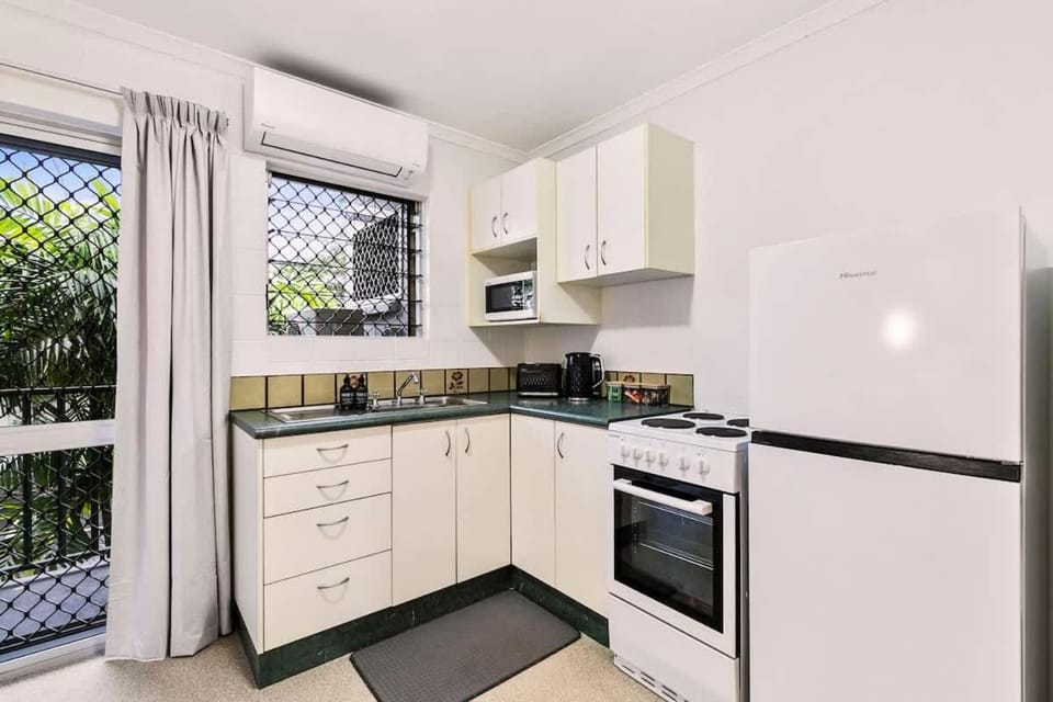 Kitchen or kitchenette, oven, stove, toaster
