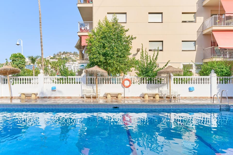 Property building, Living room, Swimming pool