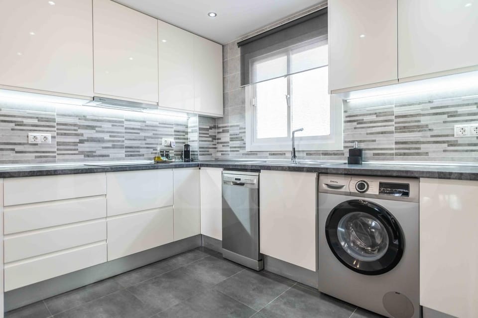 Kitchen or kitchenette, dishwasher, stove, washing machine