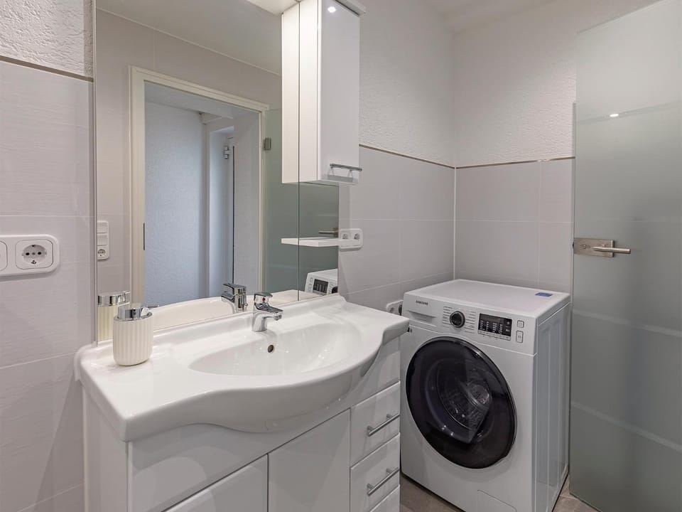 Bathroom, washing machine, dryer