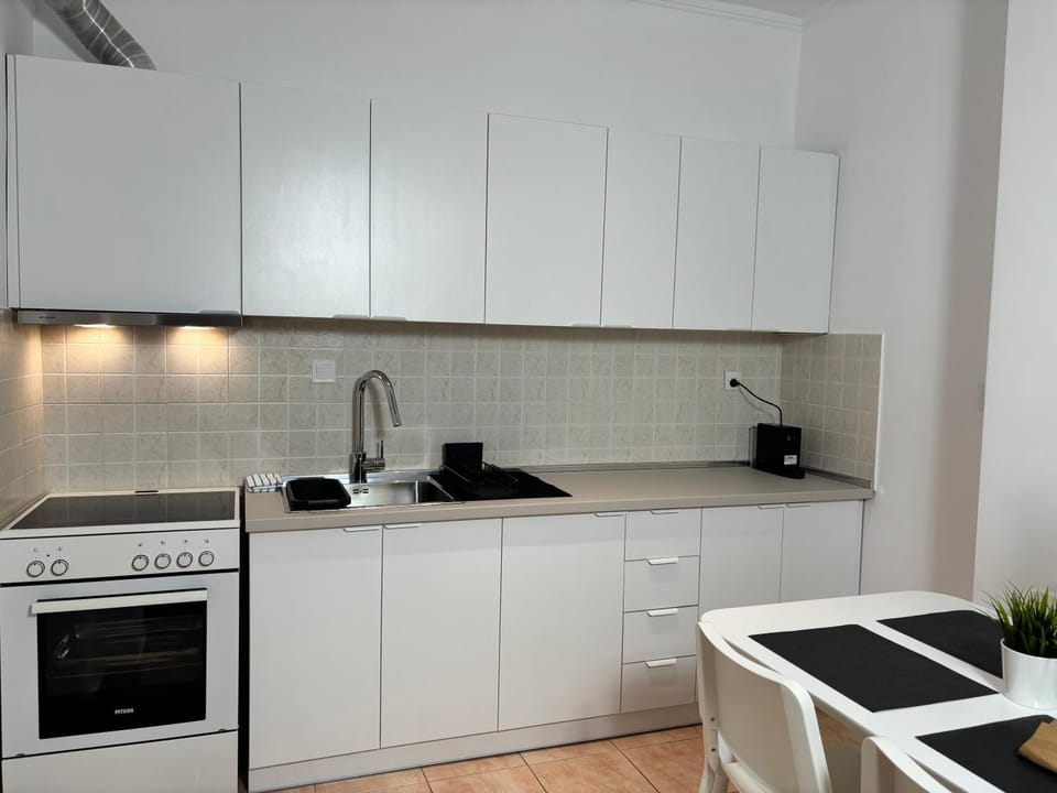 Kitchen or kitchenette, stove