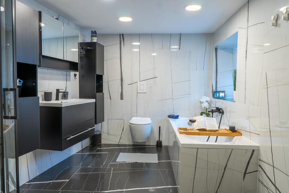 Shower, Toilet, Bathroom, Bath, flat iron, hair dryier, towels