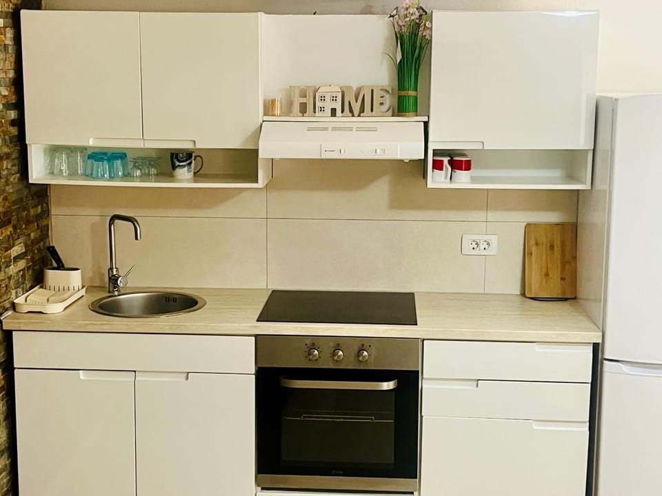 Kitchen or kitchenette, stove
