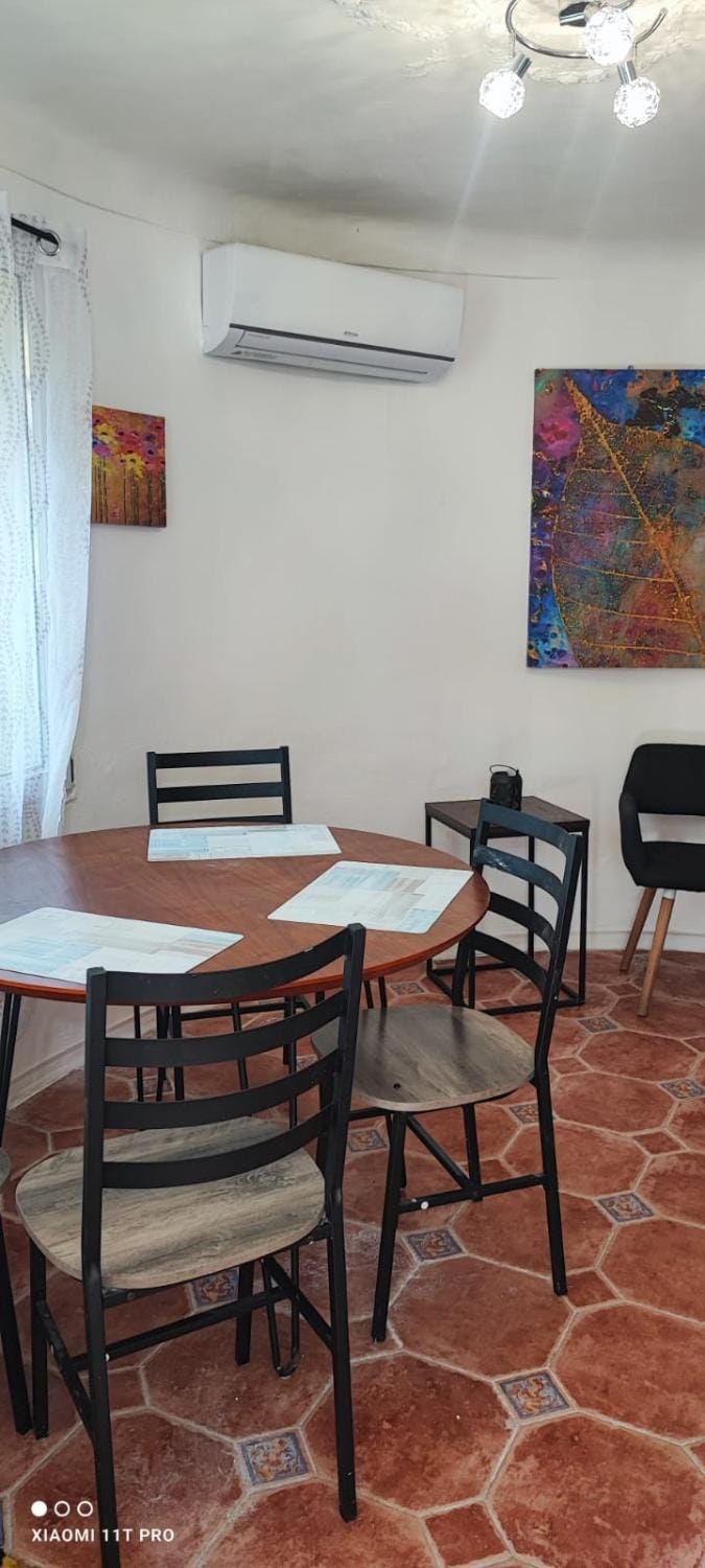 Living room, Seating area, Dining area, air conditioner