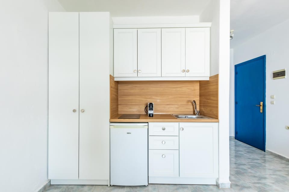 Kitchen or kitchenette, stove, wardrobe