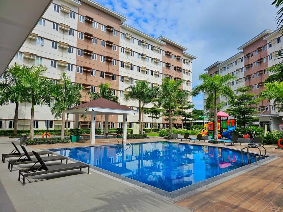 Property building, Pool view, Swimming pool, sunbed