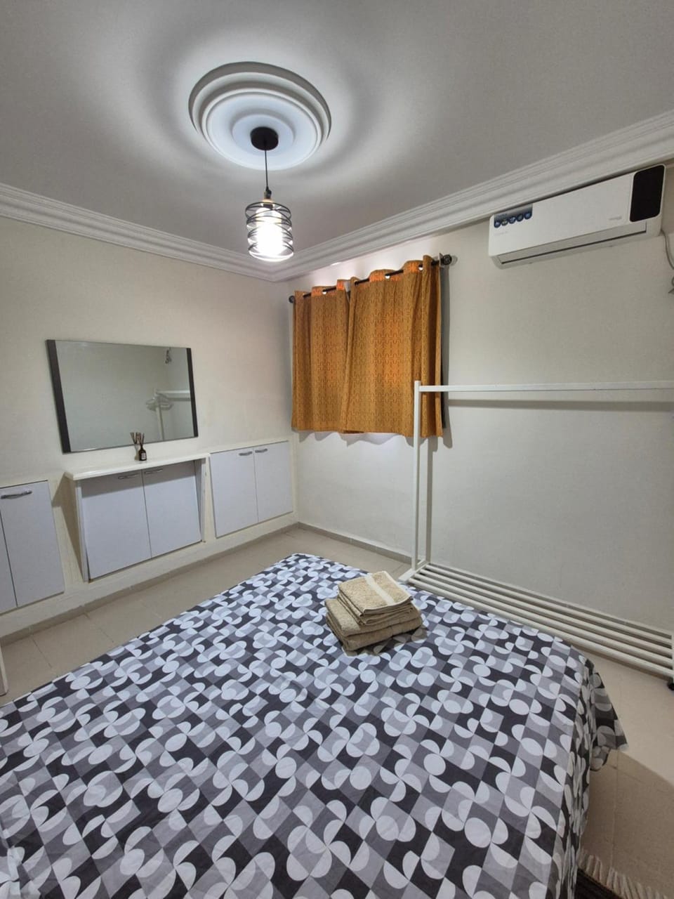 Bed, Bedroom, towels, wardrobe, air conditioner