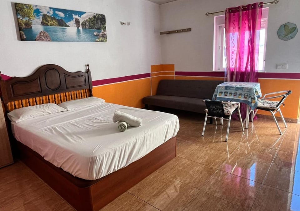 Bed, Seating area, Bedroom