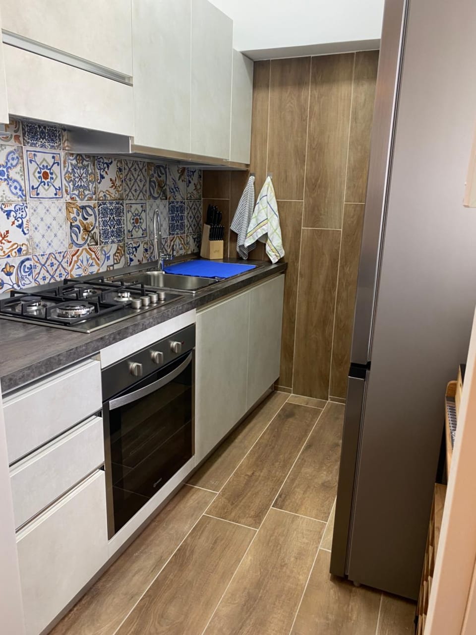 Kitchen or kitchenette, oven, stove