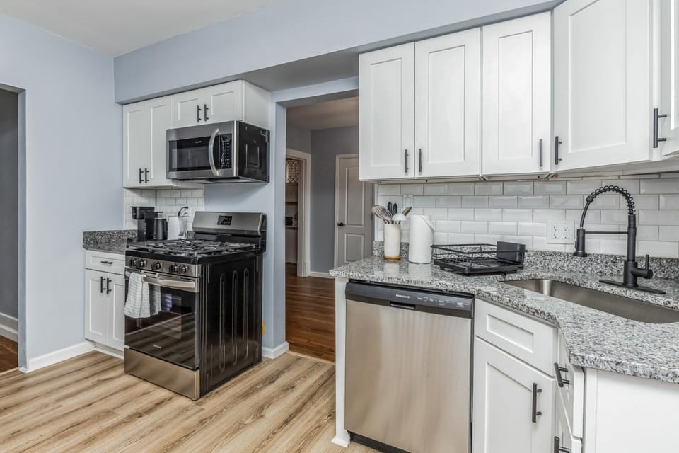 Kitchen or kitchenette, dishwasher, oven, stove, toaster