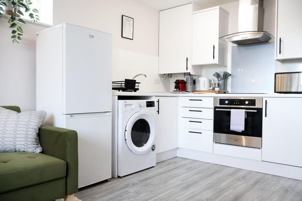 microwave, oven, stove, washing machine, kitchen