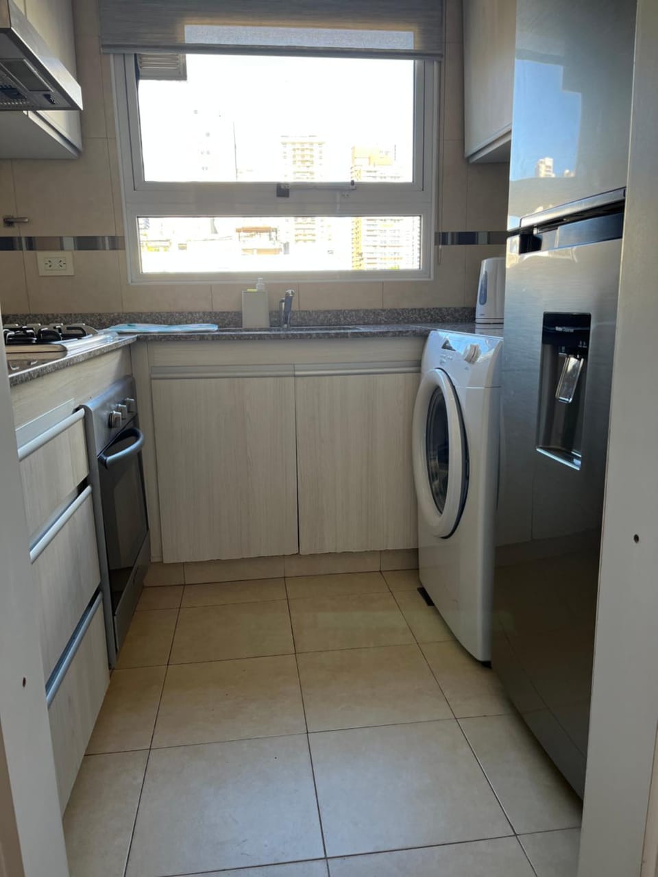 Kitchen or kitchenette, oven, stove, washing machine